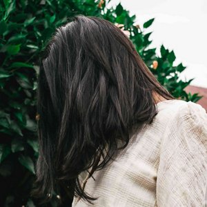 woman with grey hair over hair face